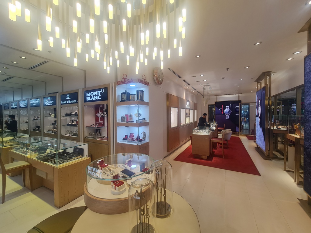 A watch movement being assembled by a watchmaker.